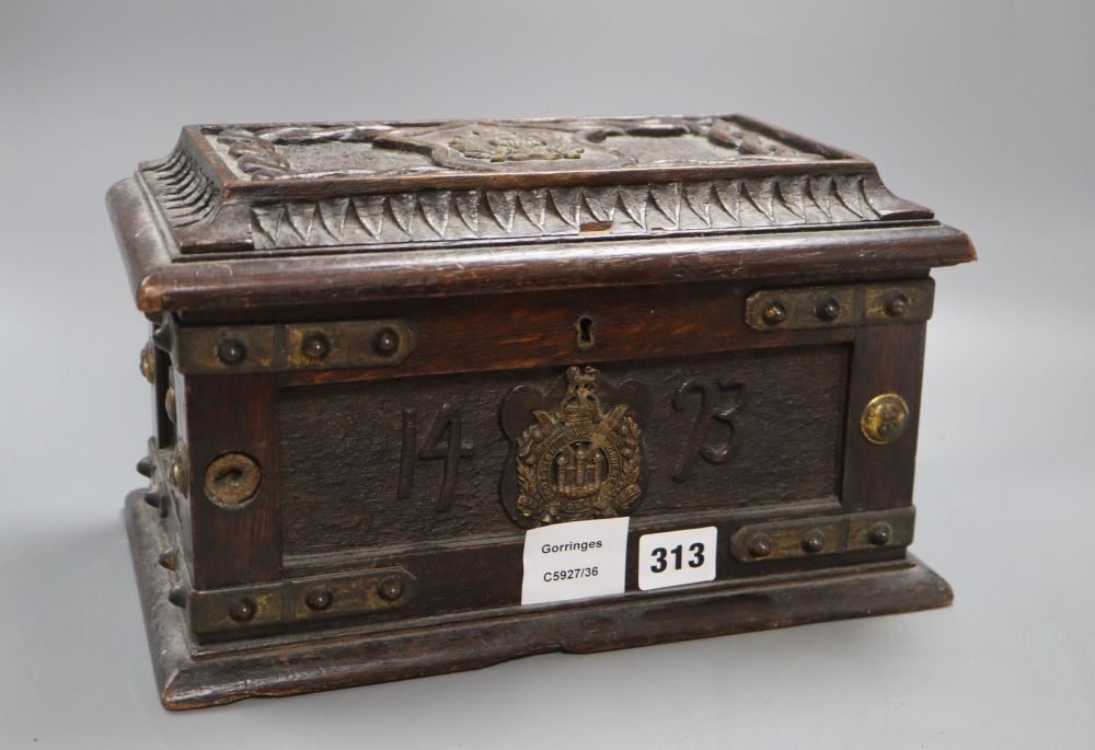 A brass bound wooden box, plaque to interior of lid reads made from oak, Old Parliament House, Edinburgh, 1493, length 30cm